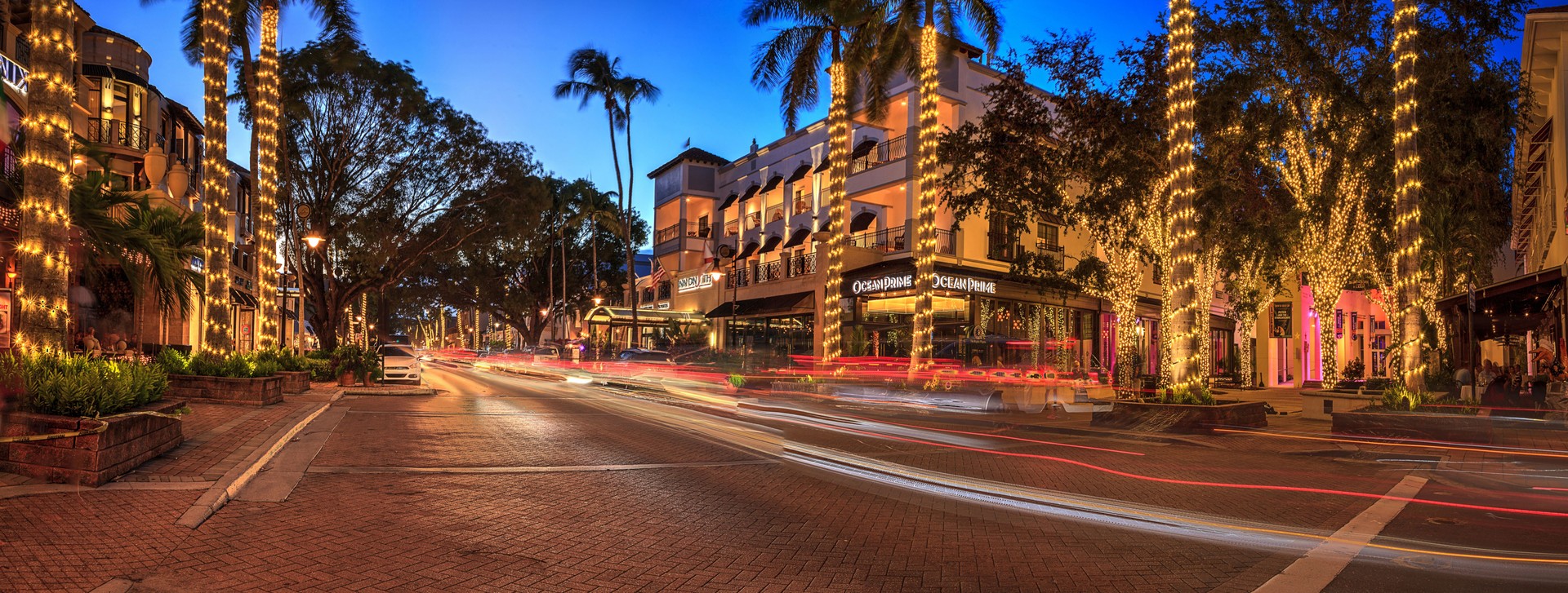 Sunset over the shops along 5th Street in Old Naples, Florida.